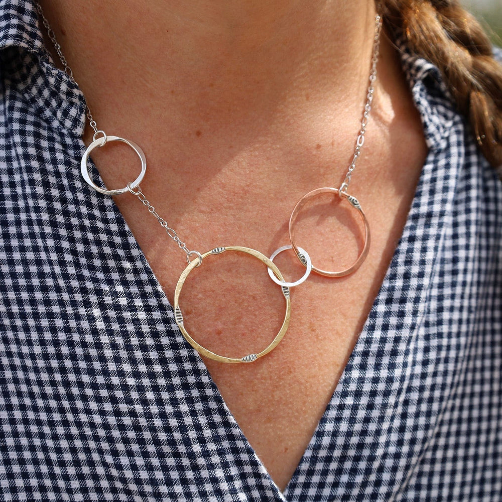 
                  
                    NKL Mixed Metals Random Circles Necklace
                  
                