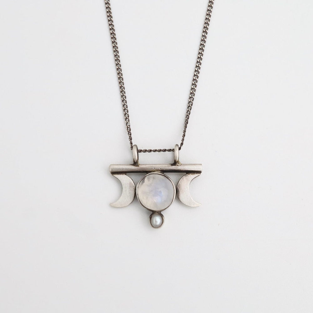 
                      
                        NKL Moon Goddess Amulet with Moonstone & Pearl Necklace
                      
                    