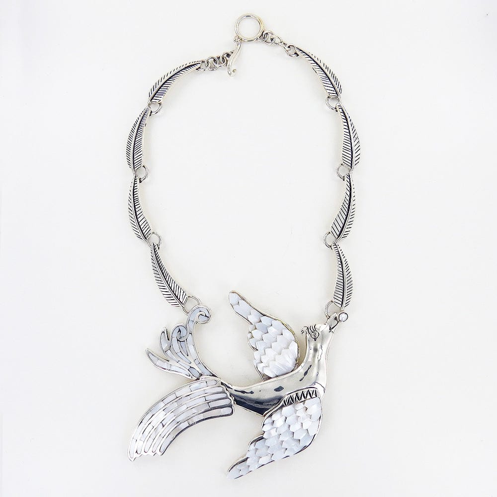 
                      
                        NKL MOTHER OF PEARL DOVE NECKLACE
                      
                    