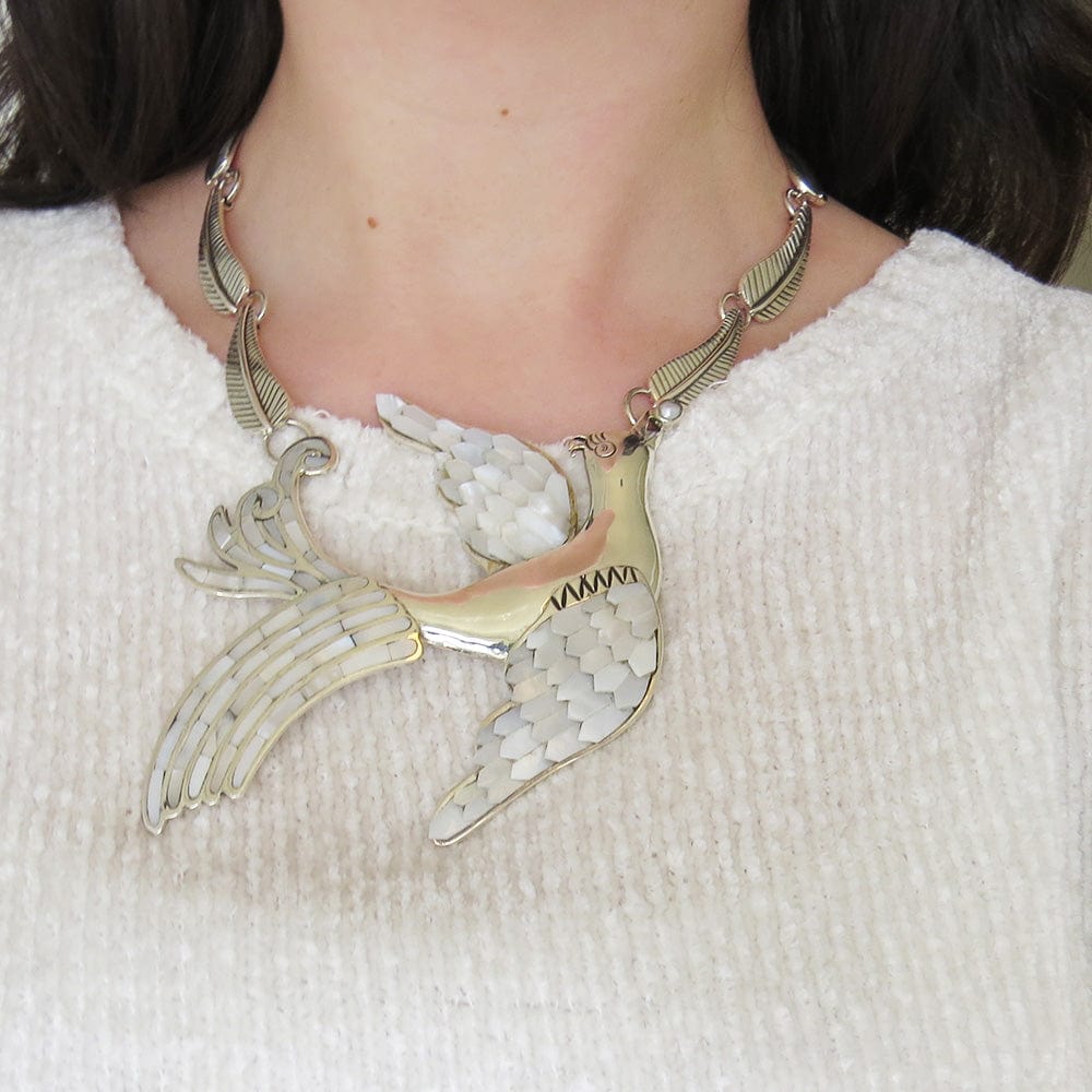 
                      
                        NKL MOTHER OF PEARL DOVE NECKLACE
                      
                    