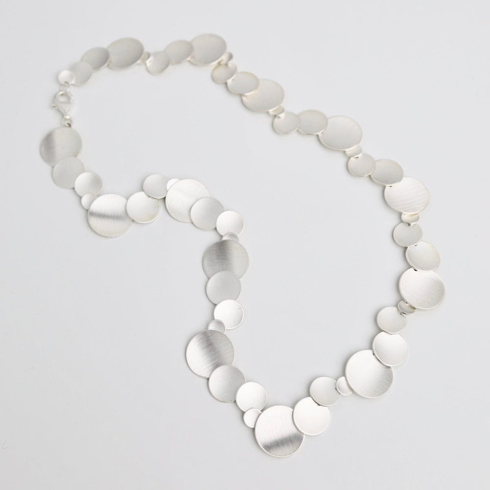 
                  
                    NKL Multi Disk Necklace
                  
                