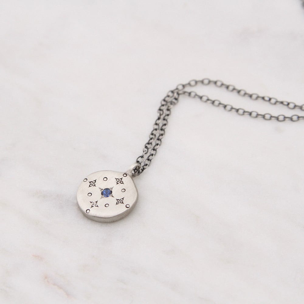 
                      
                        NKL New Moon Pendant with Sapphire
                      
                    