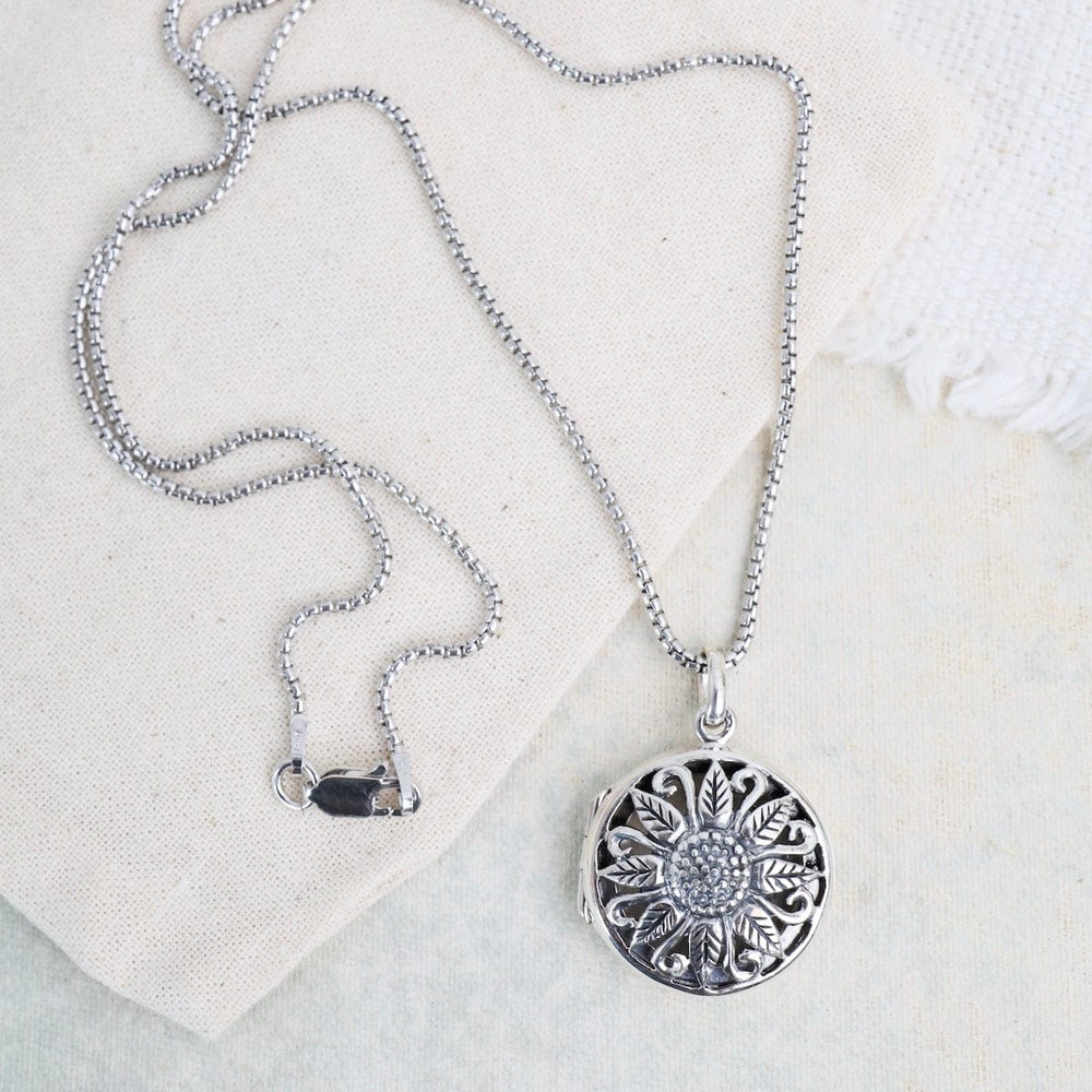 
                  
                    NKL Open Work Daisy Round Locket Necklace
                  
                