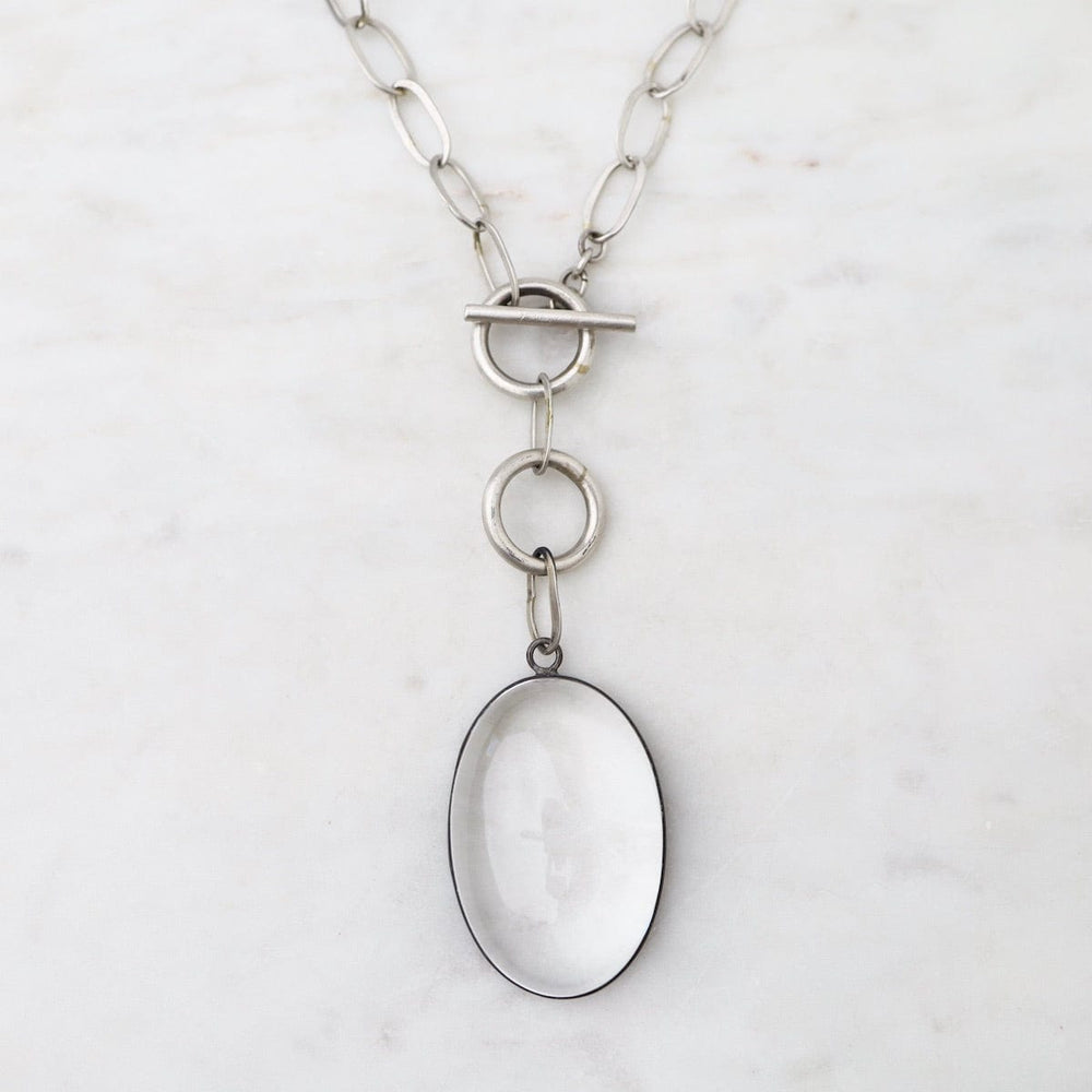 
                      
                        NKL Oval Cabochon Clear Quartz Toggle Necklace
                      
                    