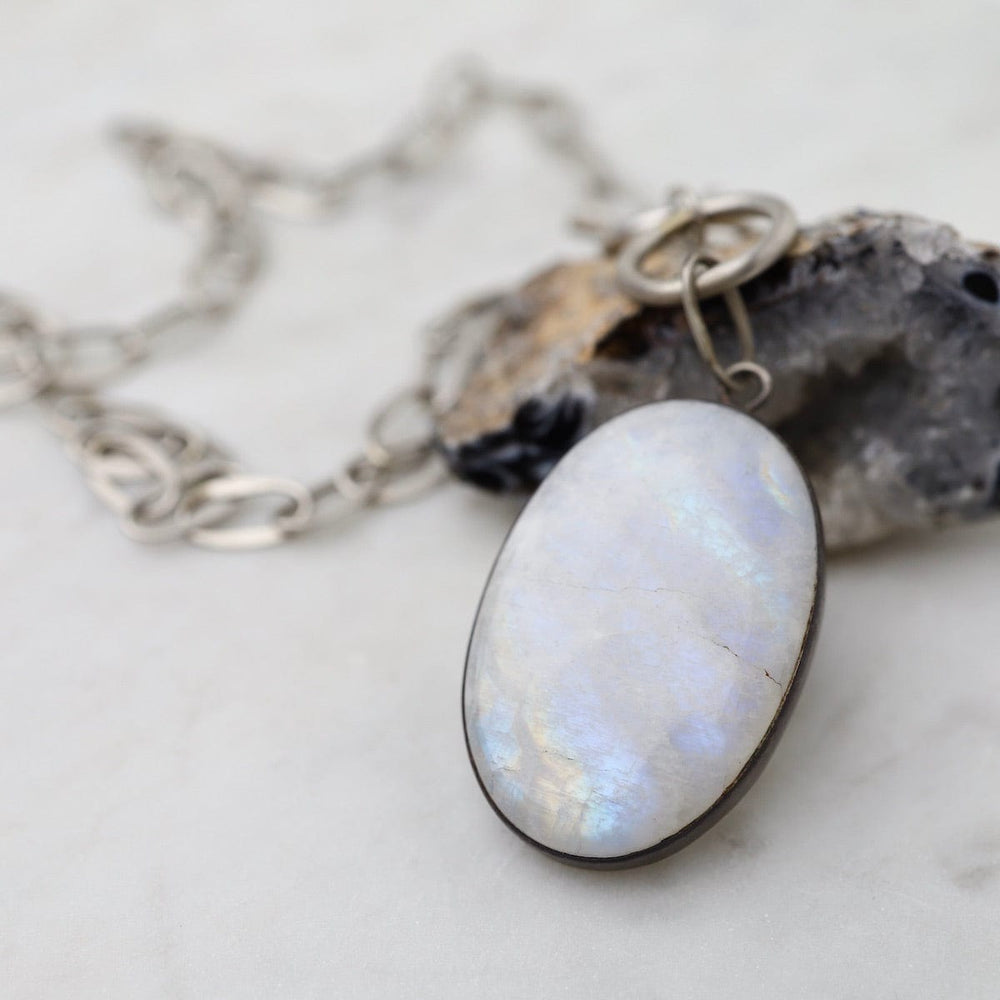 
                      
                        NKL Oval Cabochon Rainbow Moonstone Toggle Necklace
                      
                    