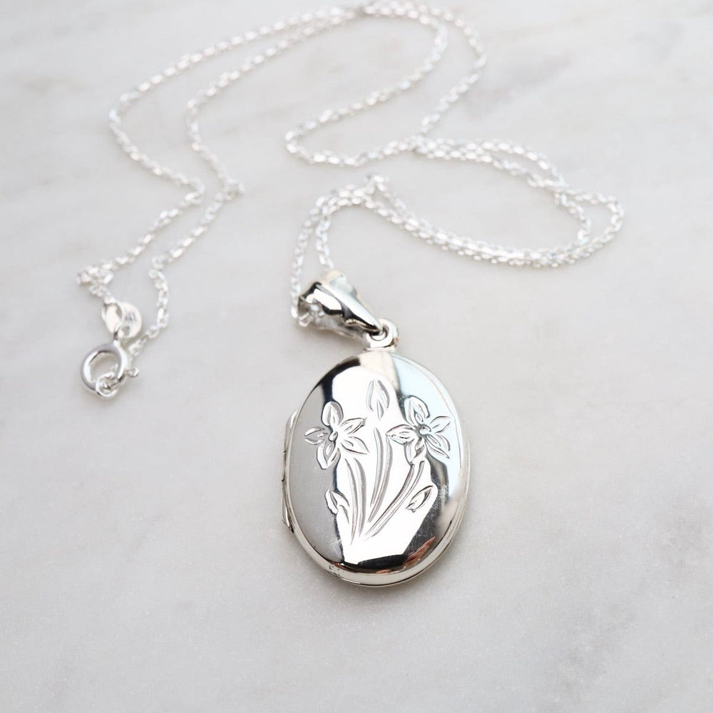 
                  
                    NKL Oval Locket Necklace with Floral Details
                  
                