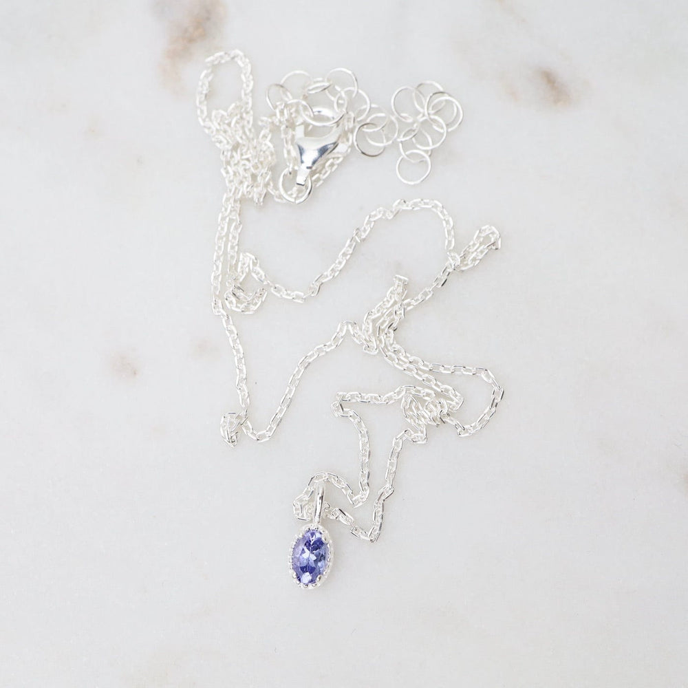 
                  
                    NKL Oval Tanzanite with Milgrain Edge Necklace - Sterling Silver
                  
                