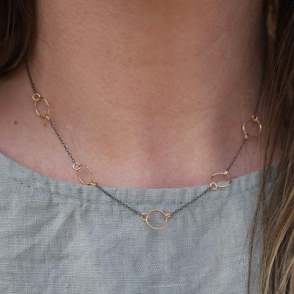 
                      
                        NKL Oxidized Chain with Small Gold Filled Hoops Necklace
                      
                    