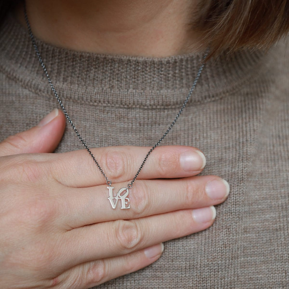 
                      
                        NKL Oxidized Silver Chain Philadelphia LOVE Sculpture Necklace
                      
                    