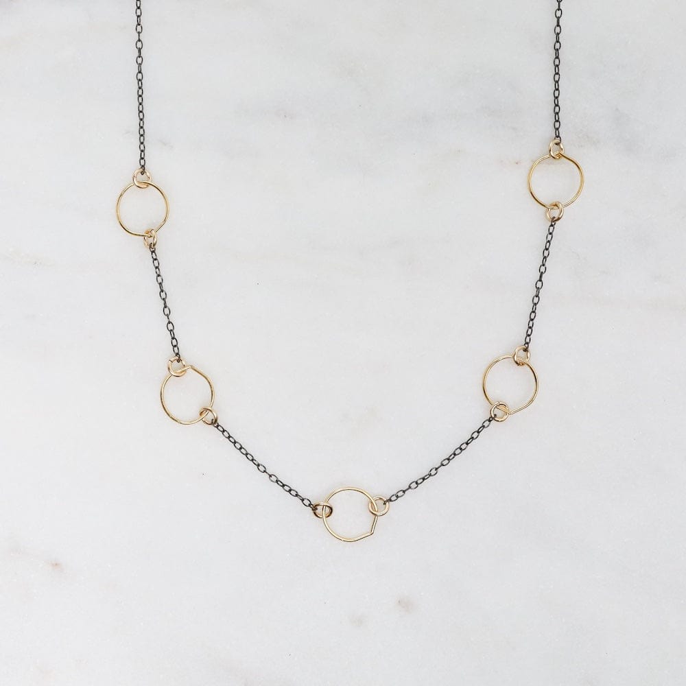 
                      
                        NKL Oxidized Sterling Silver Chain with small 14k Gold
                      
                    