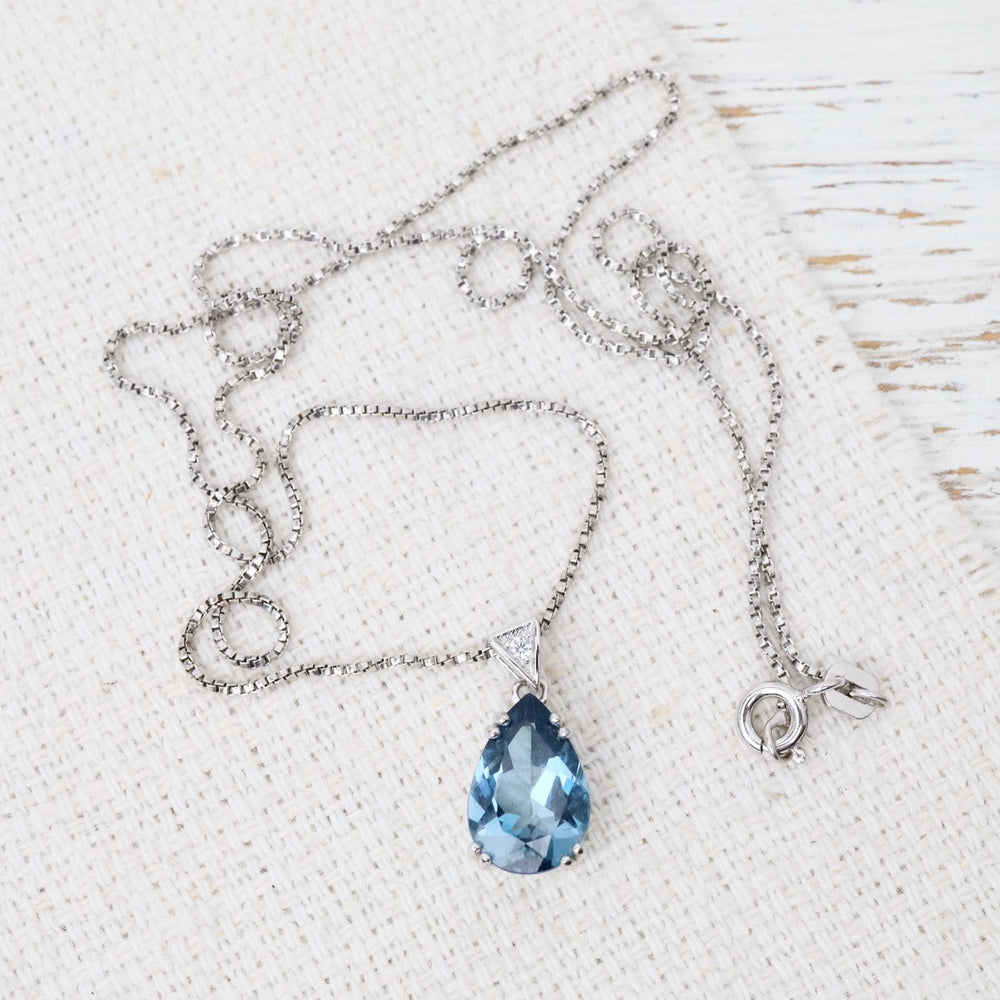 
                  
                    NKL Pear London Blue Topaz Pendant Necklace
                  
                