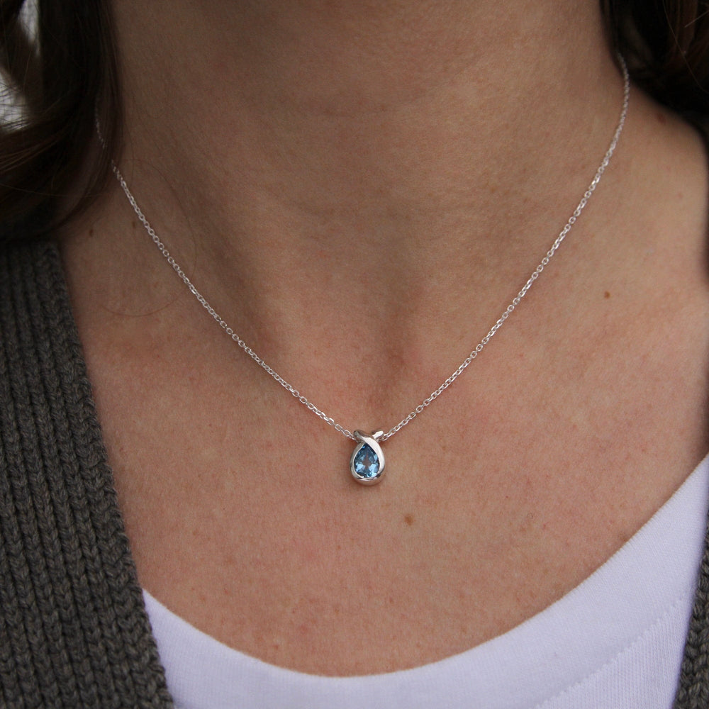 NKL Pear Shaped Blue Topaz Pendant