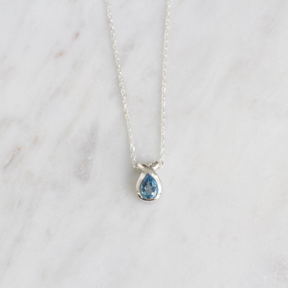 NKL Pear Shaped Blue Topaz Pendant