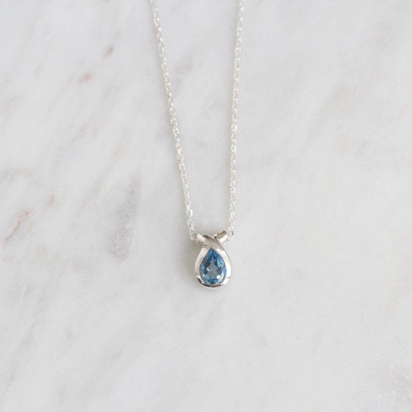 NKL Pear Shaped Blue Topaz Pendant