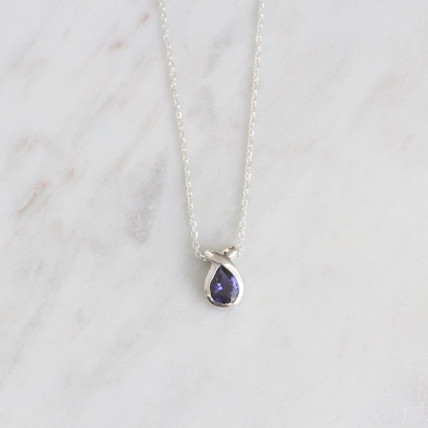 NKL Pear Shaped Iolite Pendant