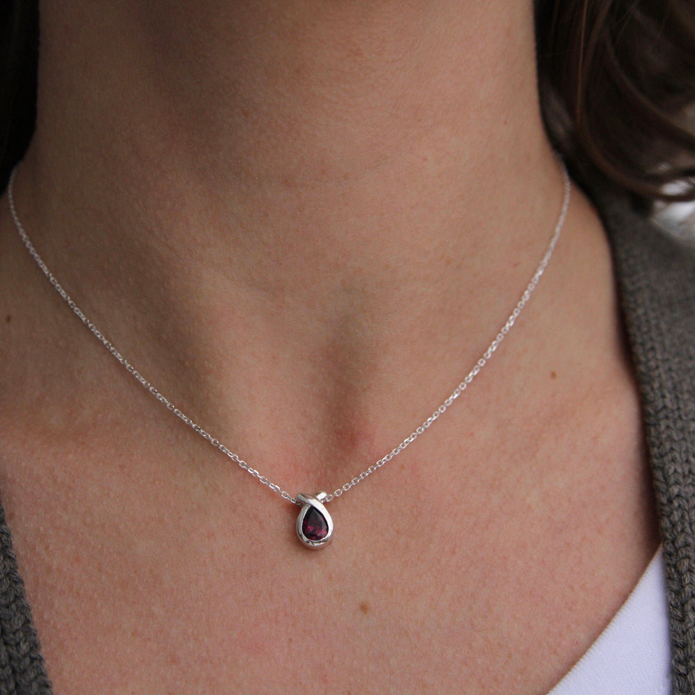 
                      
                        NKL Pear Shaped Rhodolite Garnet Pendant
                      
                    