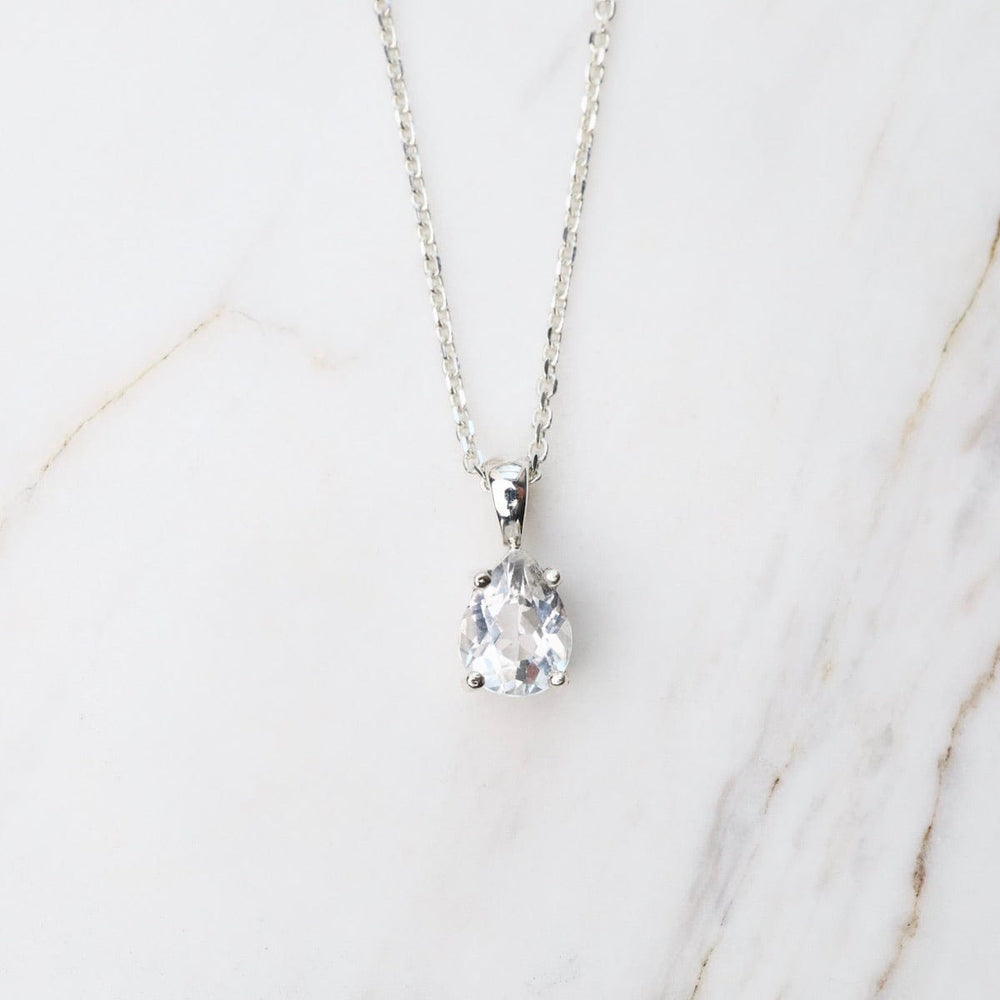 
                      
                        NKL Pear Shaped White Topaz Pendant
                      
                    