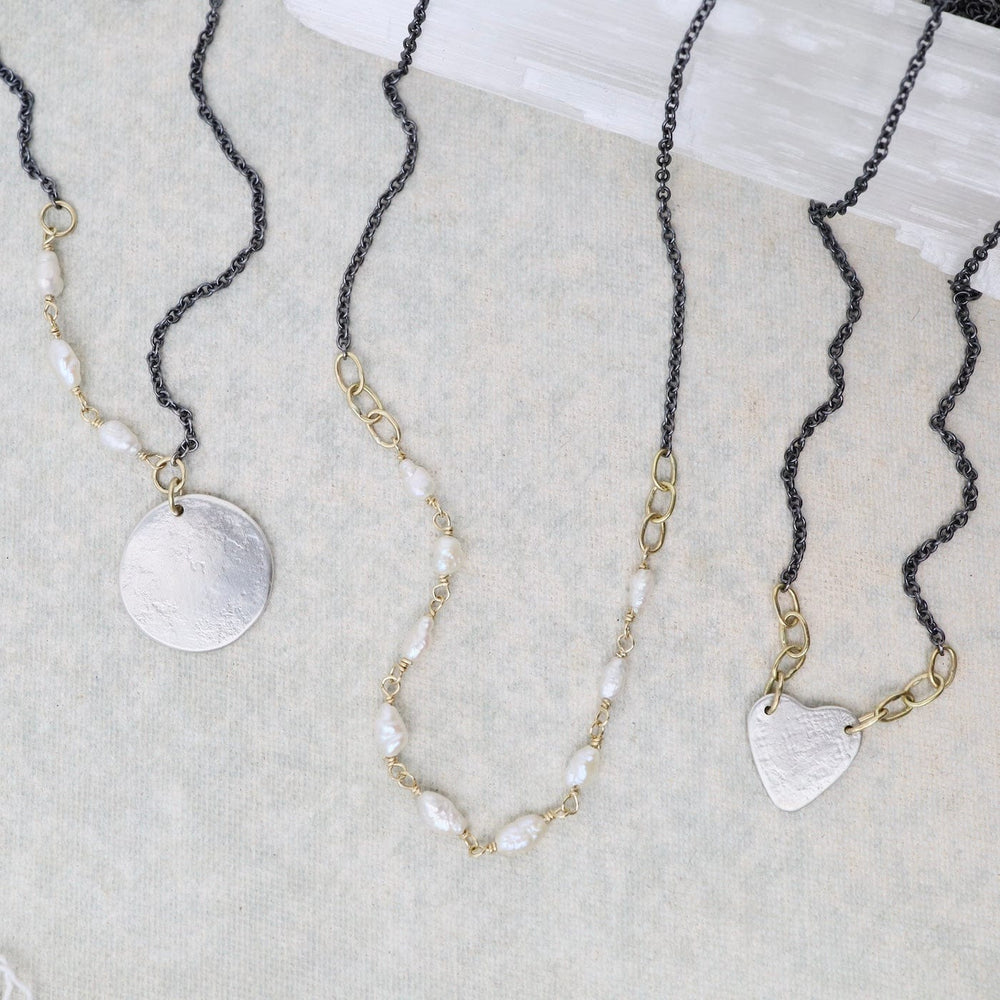 
                  
                    NKL Pearl Thieves Necklace
                  
                