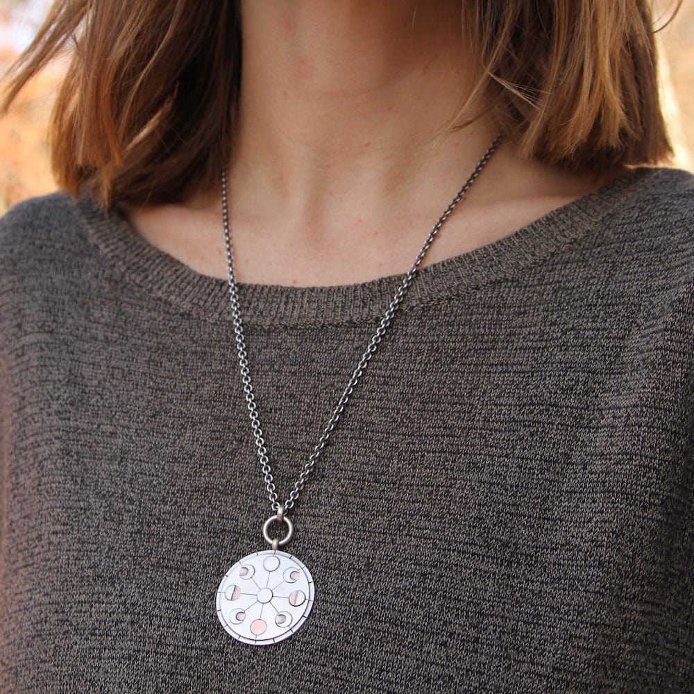 
                      
                        NKL Phases of the Moon Pendant
                      
                    