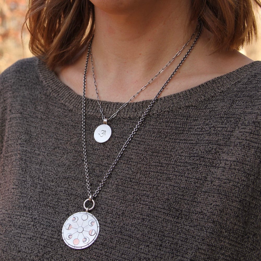 
                      
                        NKL Phases of the Moon Pendant
                      
                    