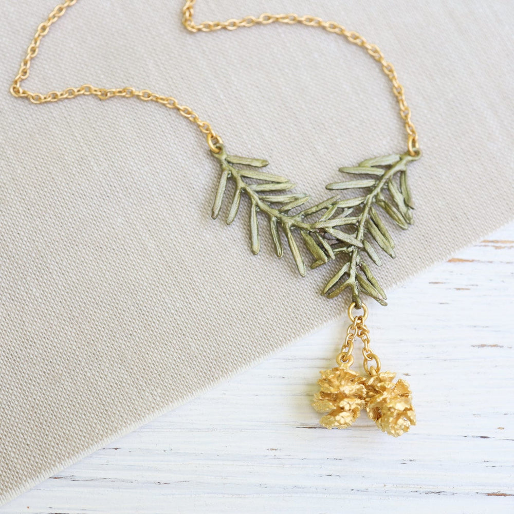 
                      
                        NKL Pine Needle Pendant
                      
                    