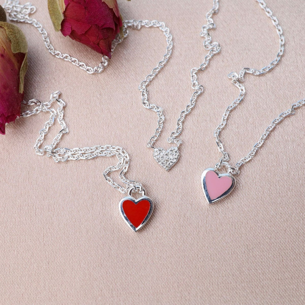 
                  
                    NKL Pink Enamel Heart Necklace in Sterling Silver
                  
                