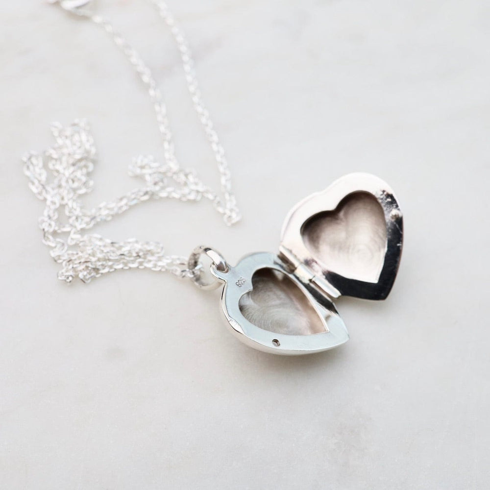 
                  
                    NKL Plain Heart Locket Necklace
                  
                