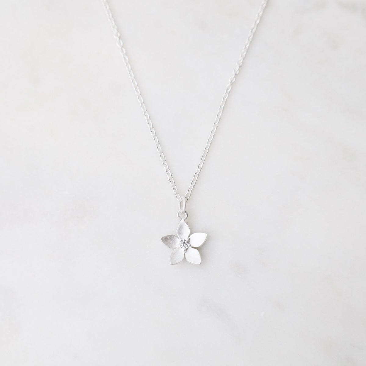 NKL Pointed Petal Flower Necklace with CZ - Brushed Sterling Silver