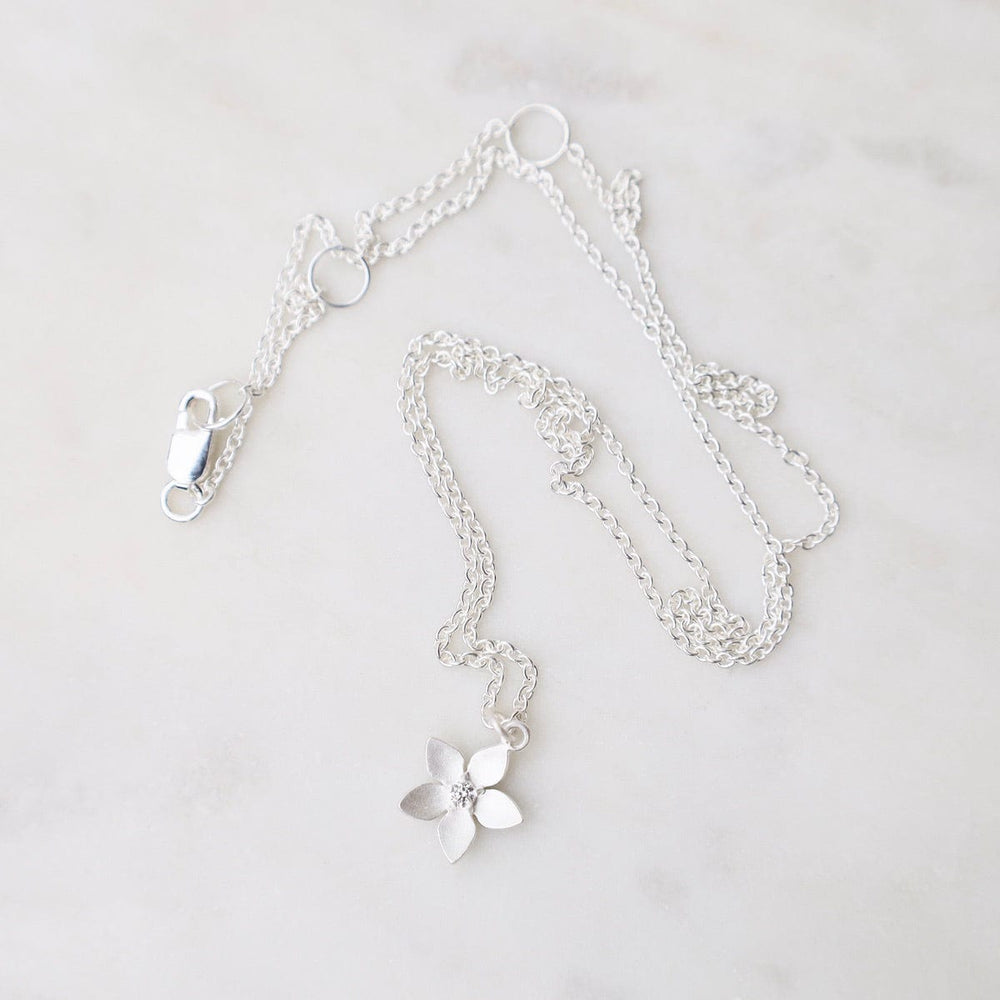 
                  
                    NKL Pointed Petal Flower Necklace with CZ - Brushed Sterling Silver
                  
                