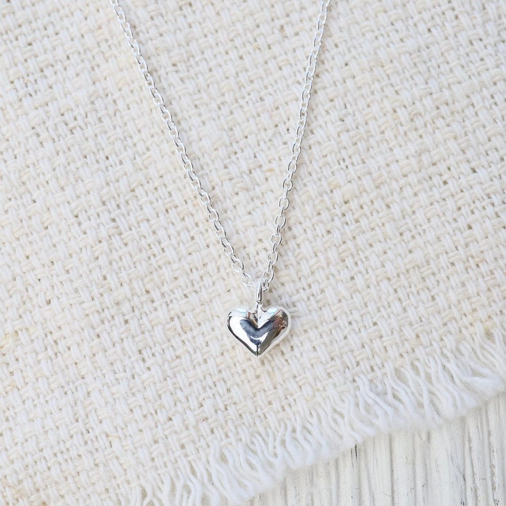 
                      
                        NKL Polished Puffy Heart Necklace in Sterling Silver
                      
                    