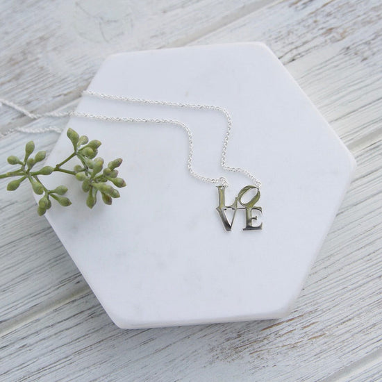 NKL Polished Silver LOVE Sculpture Necklace