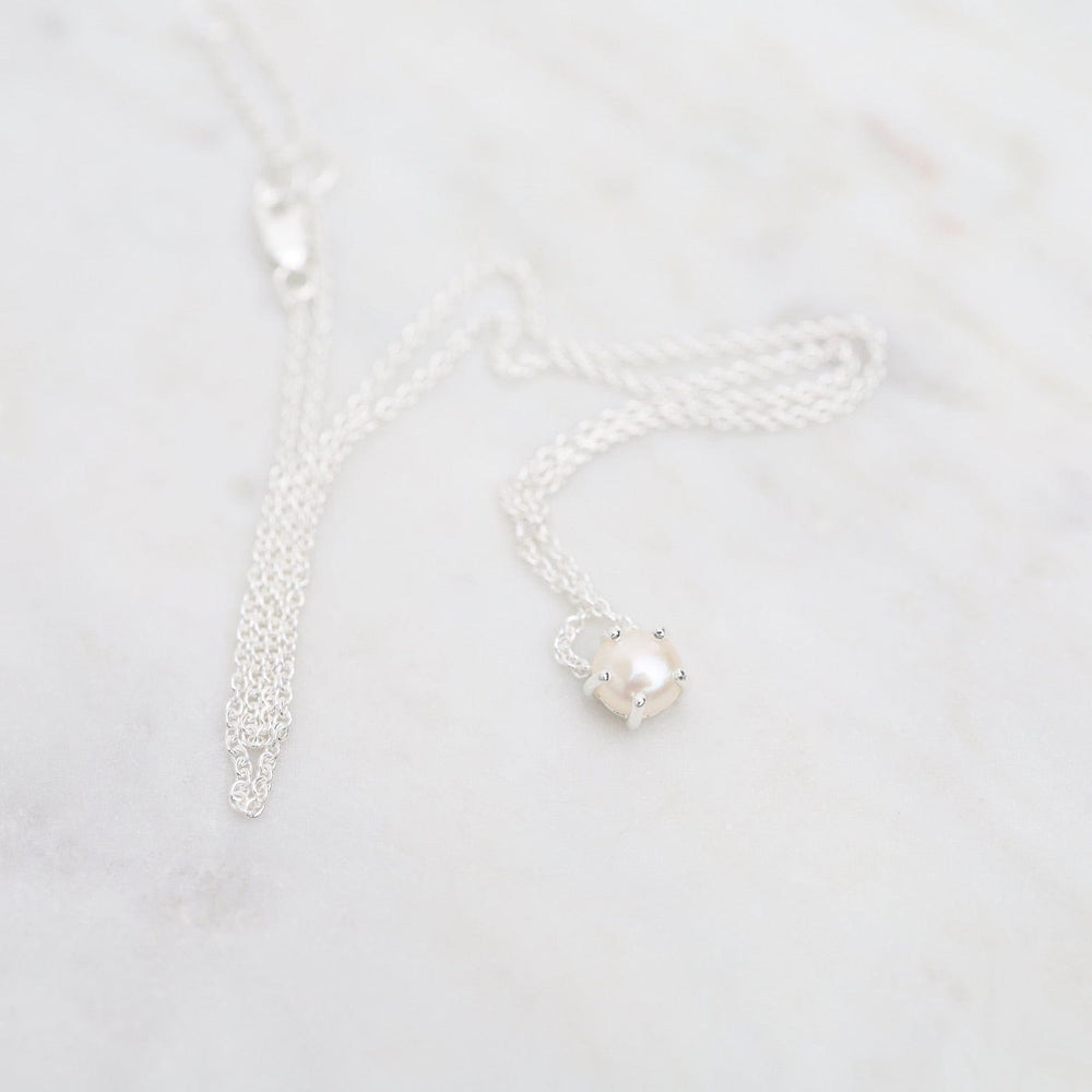 
                  
                    NKL Prong Set Pearl Necklace
                  
                