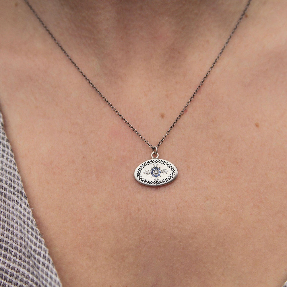 
                      
                        NKL Rays of Hope Pendant in Sapphire & Diamond
                      
                    