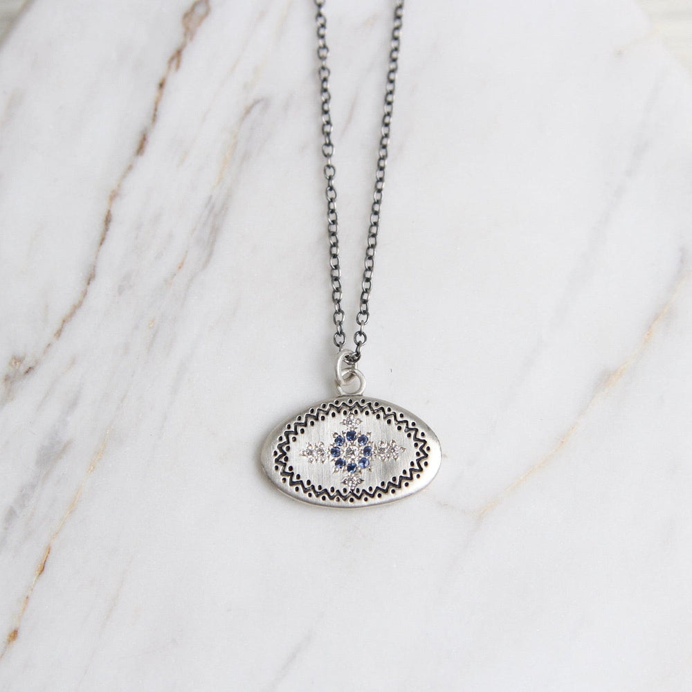 
                      
                        NKL Rays of Hope Pendant in Sapphire & Diamond
                      
                    