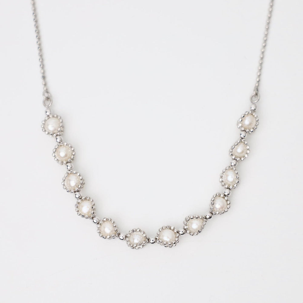 
                  
                    NKL Rhodium Plated Sterling 12 Captured Pearls Necklace
                  
                