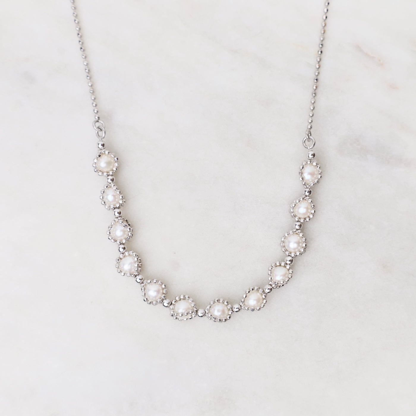 NKL Rhodium Plated Sterling 12 Captured Pearls Necklace