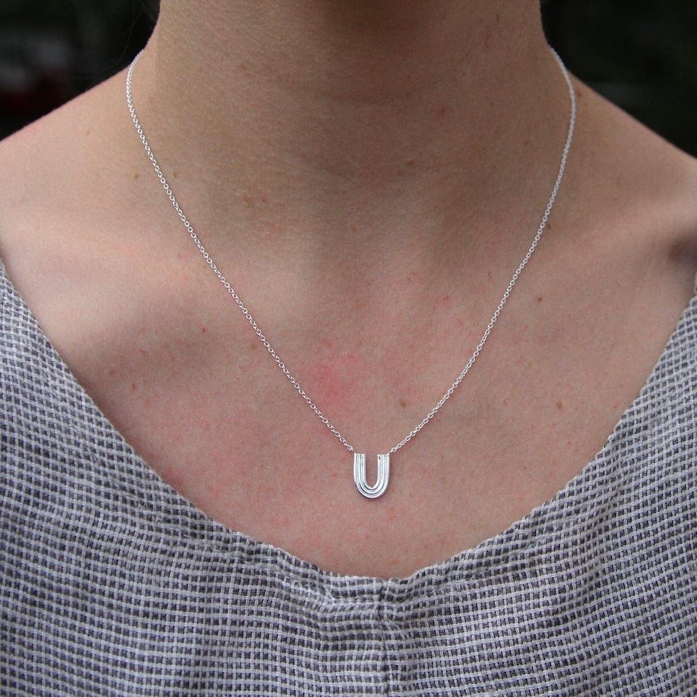 
                      
                        NKL Ridged "U" Necklace
                      
                    