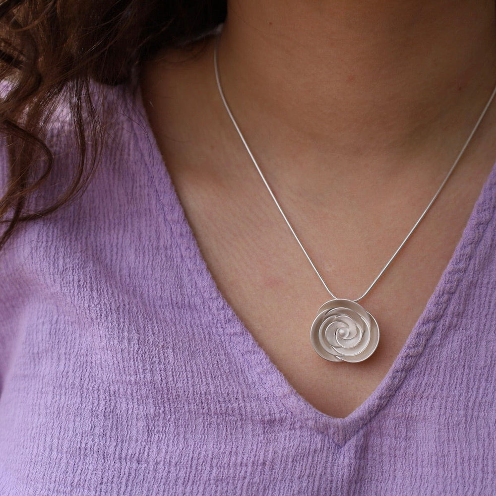 
                      
                        NKL Rose Pendant
                      
                    