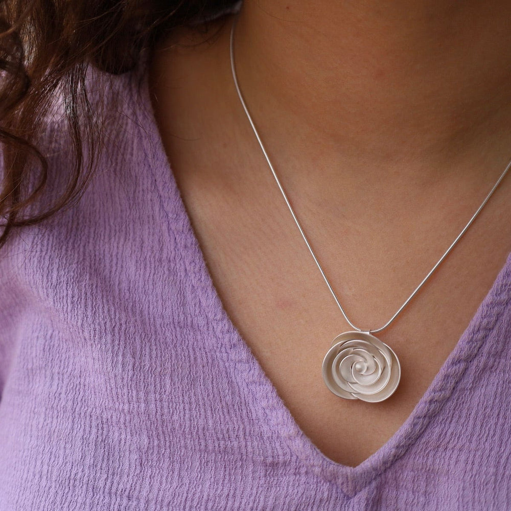 
                      
                        NKL Rose Pendant
                      
                    