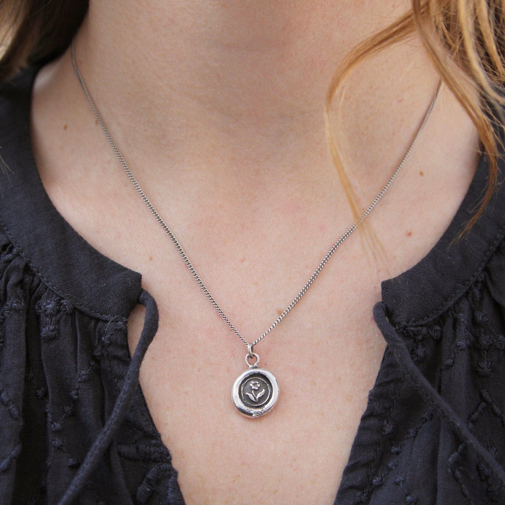 
                      
                        NKL Rose Talisman Necklace
                      
                    