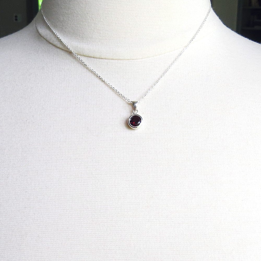 
                      
                        NKL Round African Garnet Pendant
                      
                    