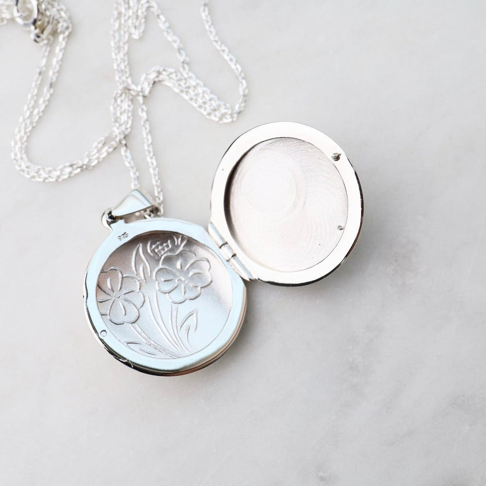 
                  
                    NKL Round Locket Necklace with Floral Details
                  
                