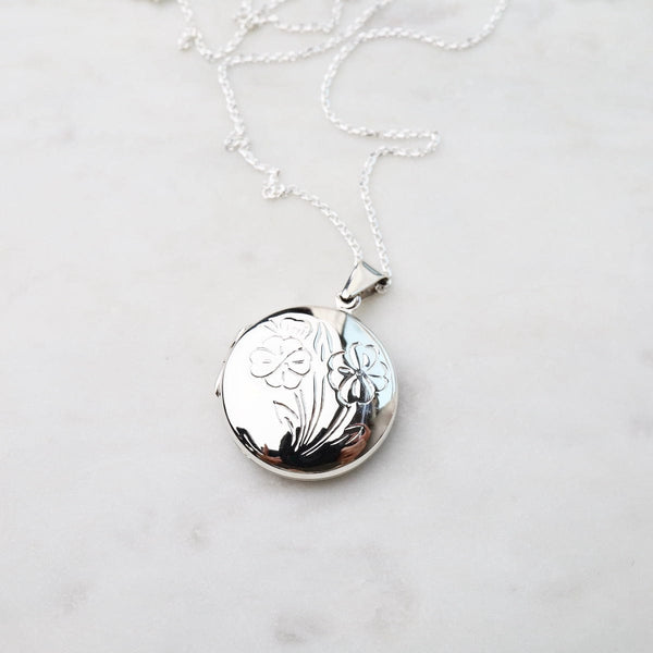 Round silver online locket