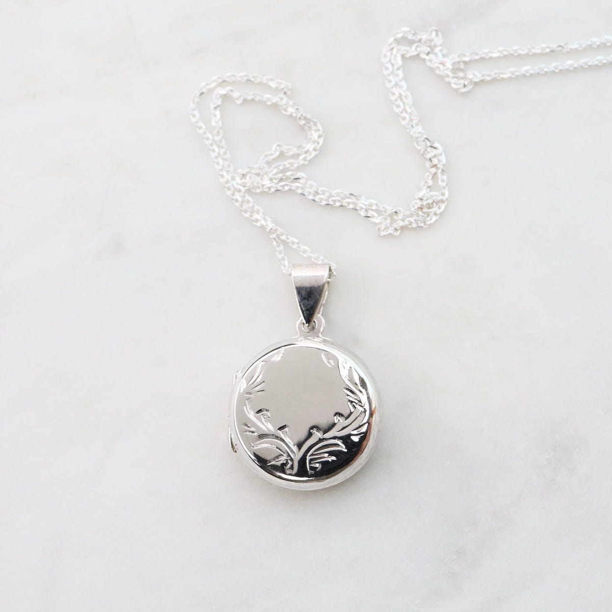 NKL Round Locket Necklace with Vine Details