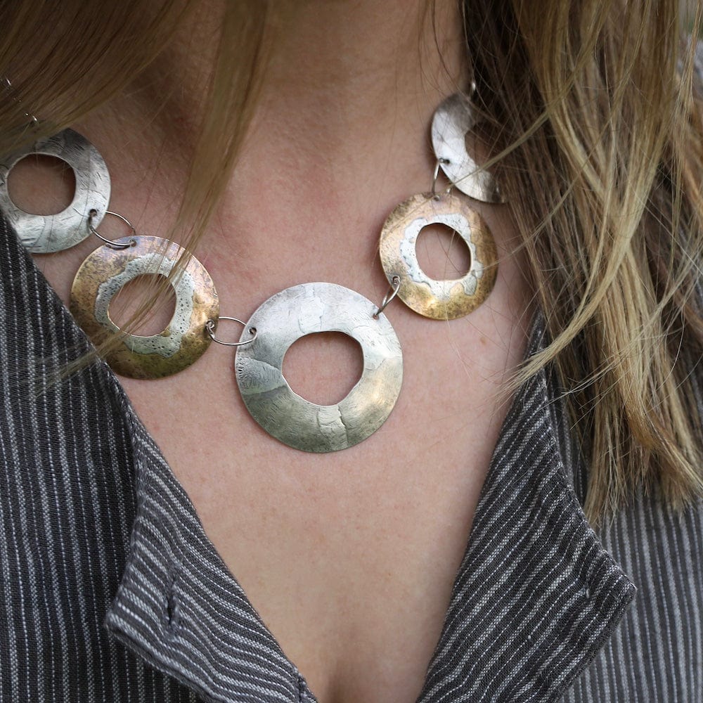 
                  
                    NKL Rugged Circles Necklace
                  
                