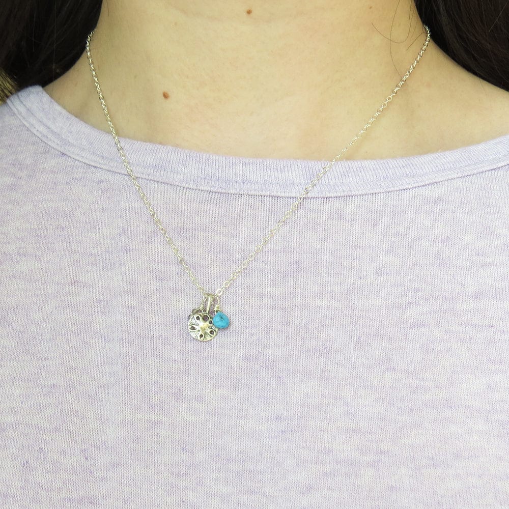 
                      
                        NKL SANDDOLLAR NECKLACE
                      
                    