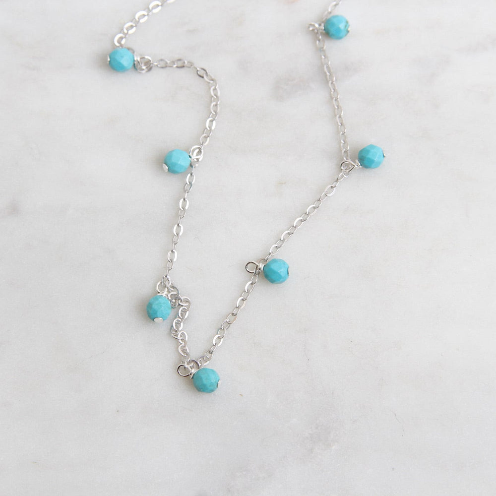 
                      
                        NKL Serena Turquoise Shaker Necklace - Silver
                      
                    