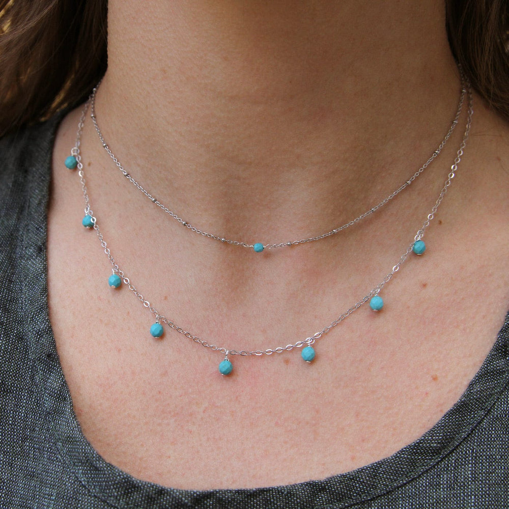 
                      
                        NKL Serena Turquoise Shaker Necklace - Silver
                      
                    