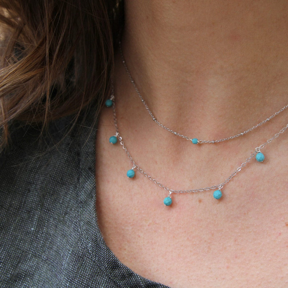 
                      
                        NKL Serena Turquoise Shaker Necklace - Silver
                      
                    