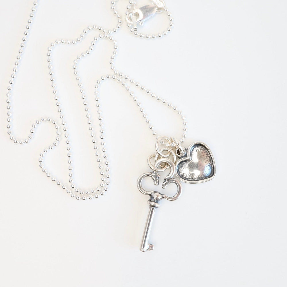 
                      
                        NKL Share Your Love Key & Heart Necklace
                      
                    